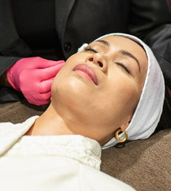 woman receiving skin care treatment